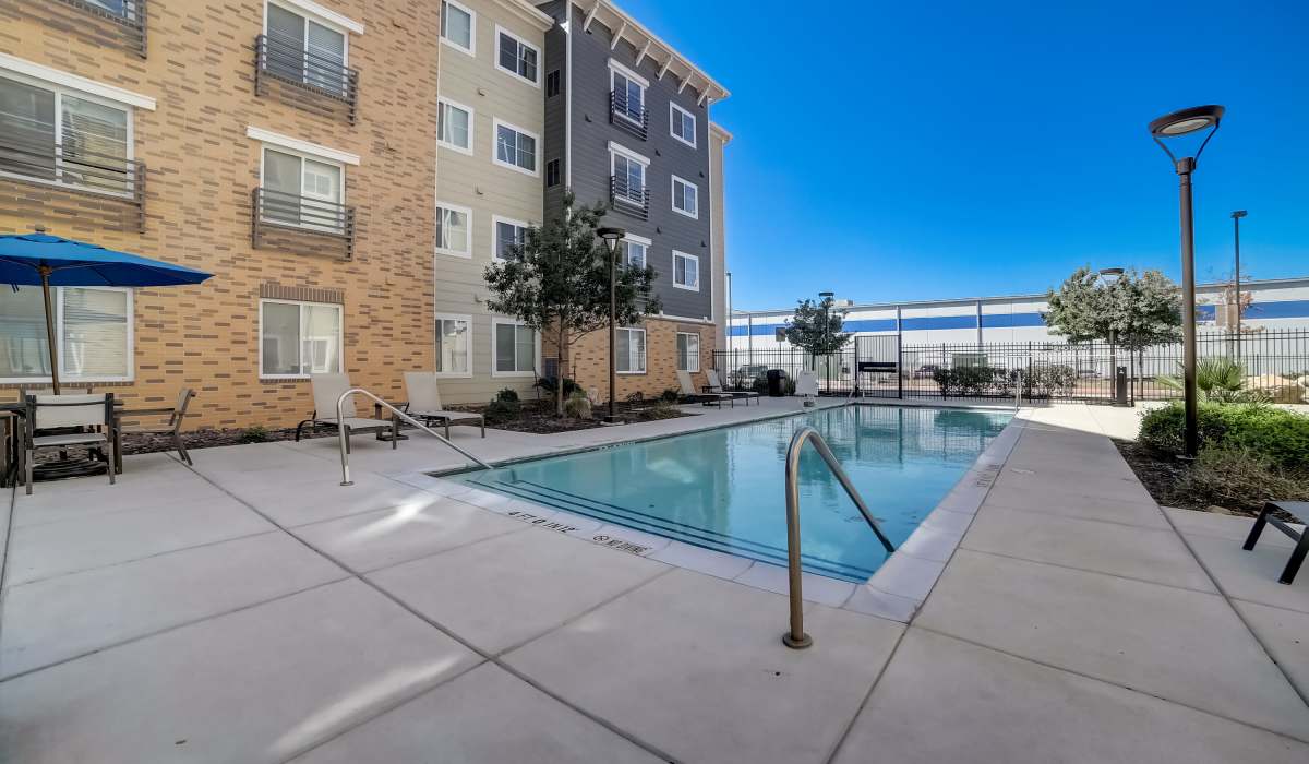 Modern rental apartment building with pool